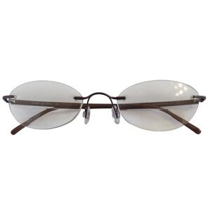 Marchon Airlock 2 Purple Rimless Oval Eyeglasses 770/106 54-20-135 Womens
